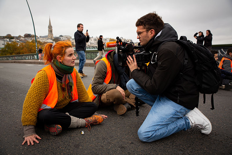 Journaliste CLPRESS filme des militants de désobeissance civile