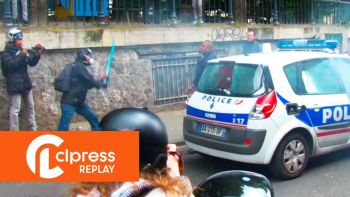 A police car set on fire on Quai de Valmy.