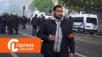 Alexandre Benalla with a "police" armband